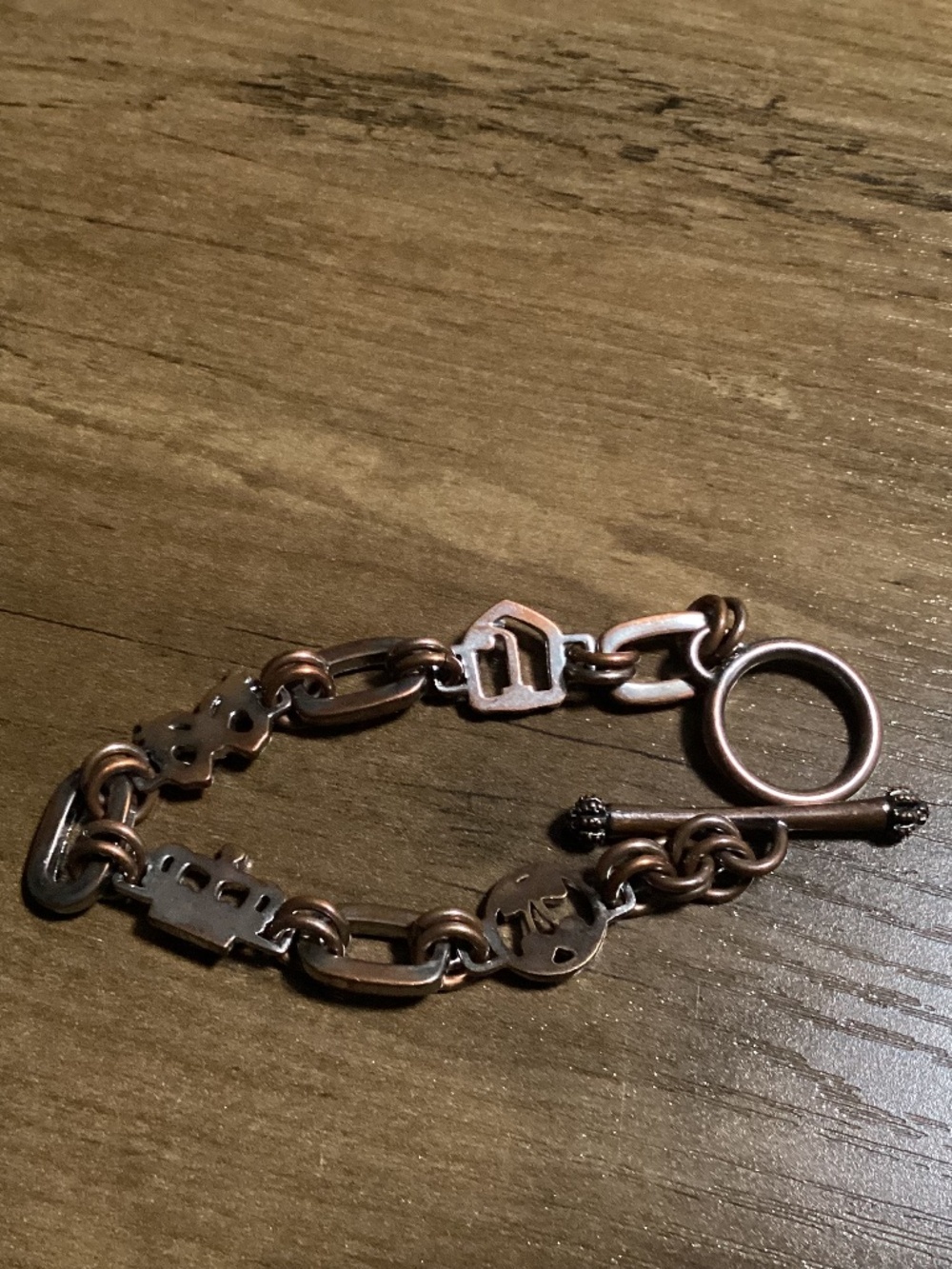 Juicy Couture charm bracelet faded silver tone Toggle clasp Crown charm